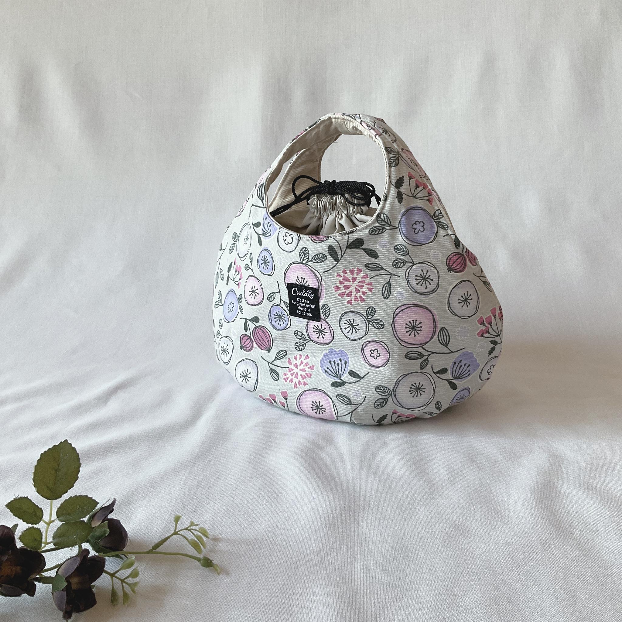 中身が見えないのが嬉しい　北欧柄の小さなころりんバッグ1枚目の画像