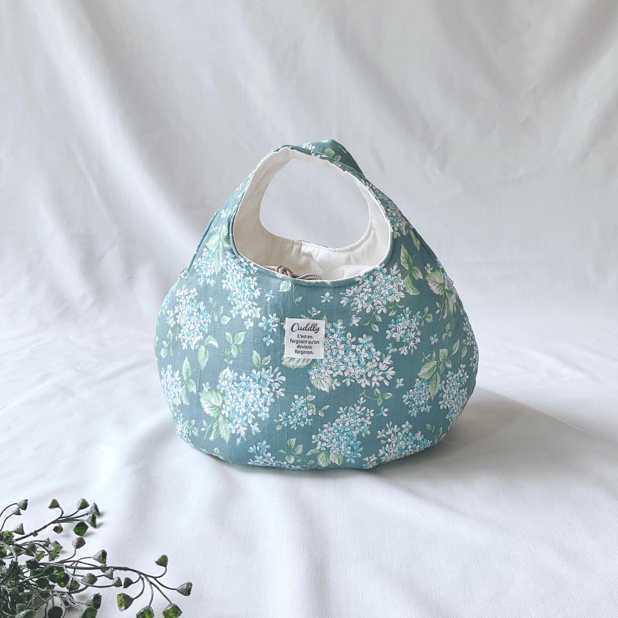 花柄の小さなころりんバッグ　Sサイズ　中身が見えないのが嬉しい1枚目の画像